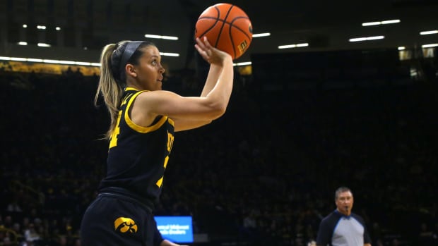 Iowa s Gabbie Marshall (24) shoots against Wisconsin Tuesday, Jan. 16, 2024 at Carver-Hawkeye Arena in Iowa City, Iowa.  